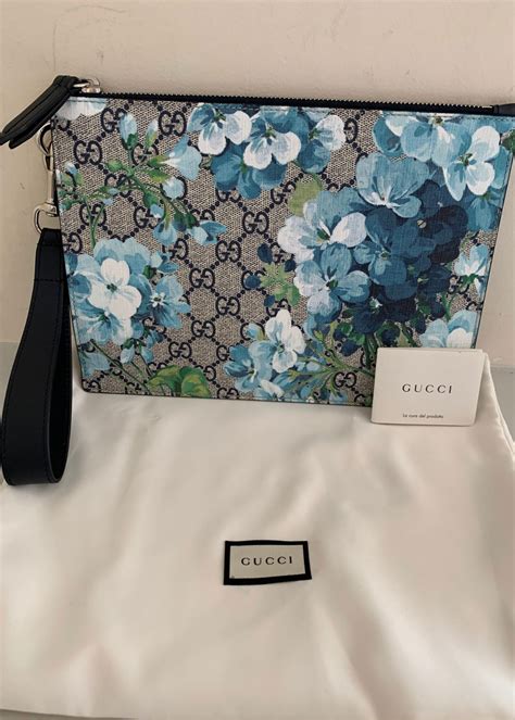 large gucci bloom clutch|gucci supreme clutch.